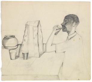 Man Drinking at Table